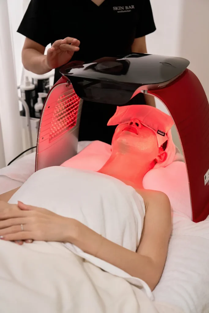 A client relaxing during a facial treatment at SKIN BAR, in a private space with no pressure to hurry.